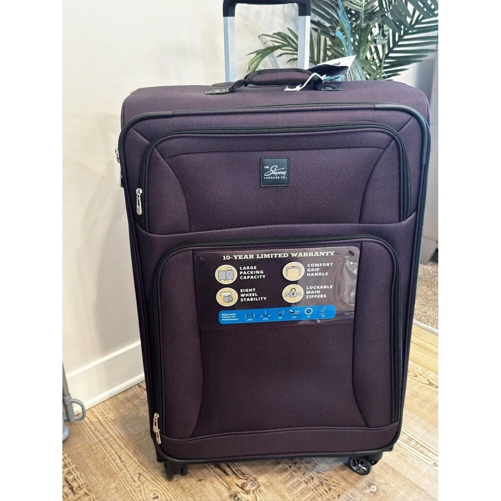 Skyway Epic Large Check-in Spinner Softside purple Suitcase luggage